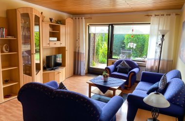 Wohnzimmer Ferienwohnung Rosenzauber Dieses Foto zeigt das Wohnzimmer der Ferienwohnung Rosenzauber